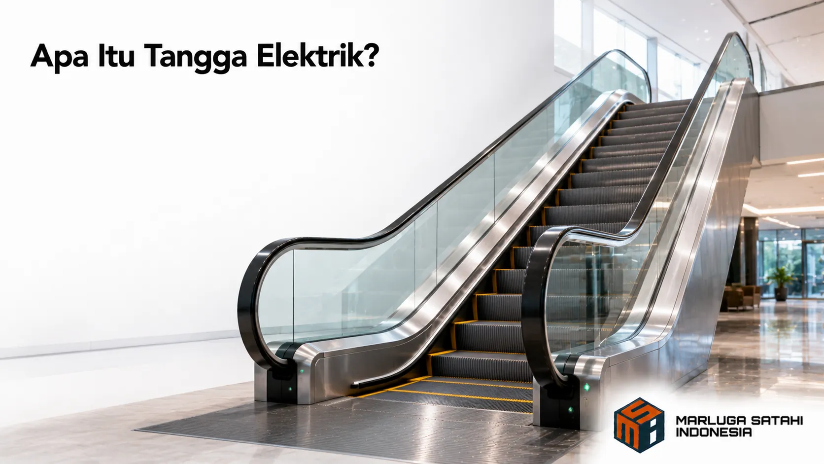 Tangga elektrik modern di dalam gedung bertingkat sebagai solusi mobilitas vertikal yang efisien.